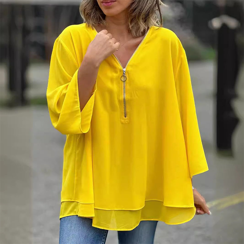 Janine | Blusa de manga con media cremallera fluida