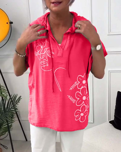 Lory | Camicetta con cappuccio floreale