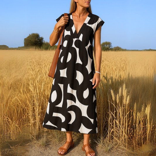 Tirzah - Vestido con escote en V fluido y estampado geométrico