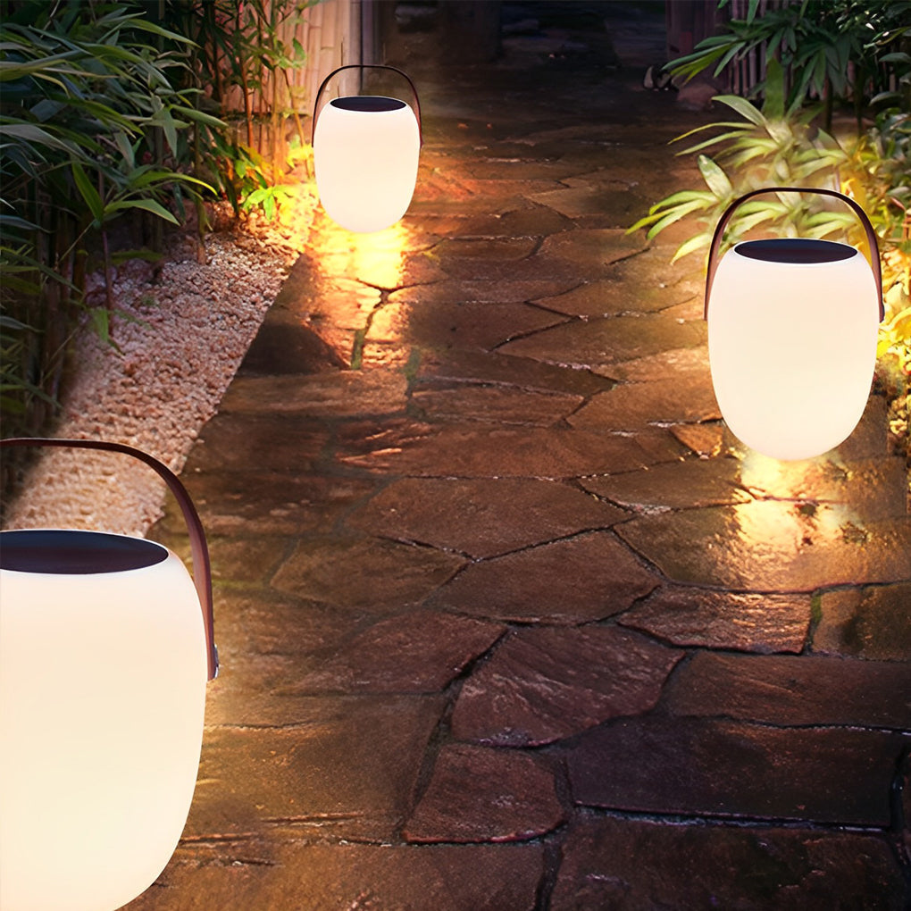 Lámpara solar de exterior con asa