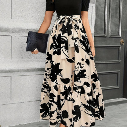 Briony - Vestido floral de cintura alta con dobladillo con volantes
