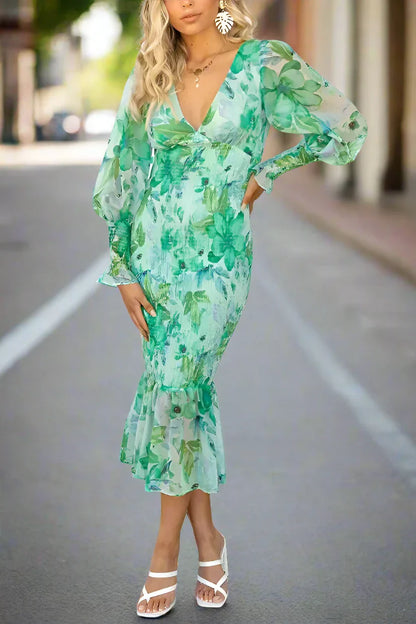 Delilah | Vestido midi floral con volantes