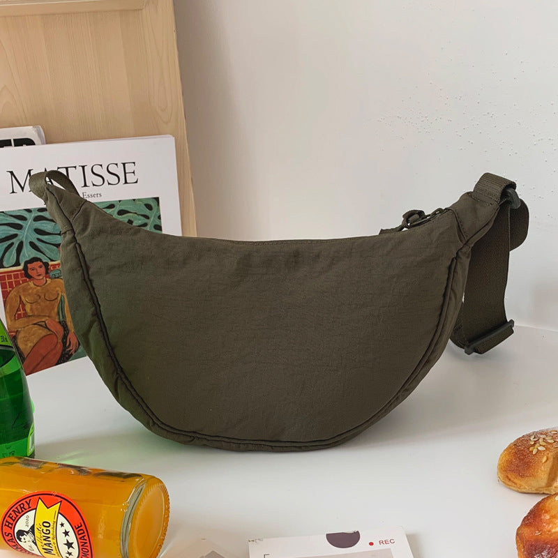 Kinnaya - Bolsa en forma de media luna