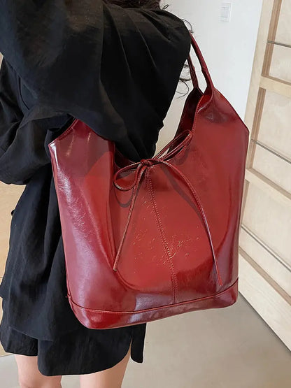 Bolsa de mano estilo cinta