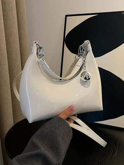 Bolso de mano brillante con cremallera y bandolera