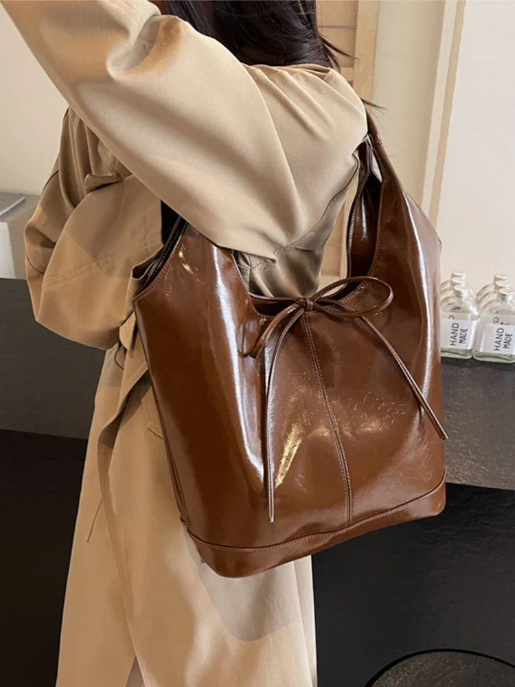 Bolsa de mano estilo cinta