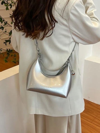 Bolso de mano brillante con cremallera y bandolera
