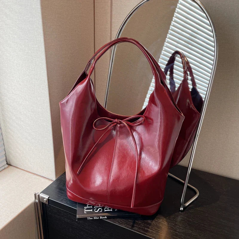 Bolsa de mano estilo cinta