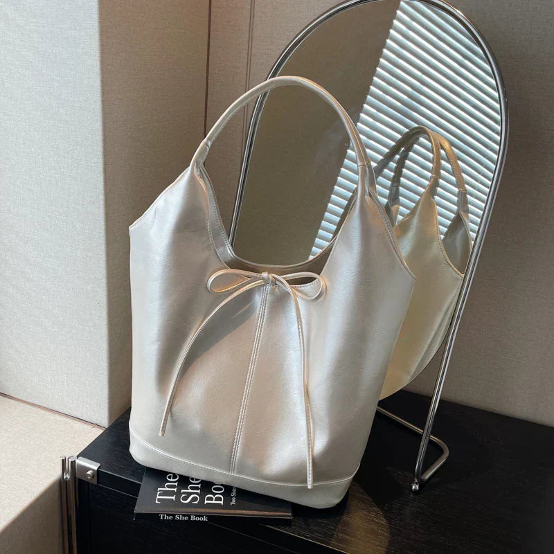 Bolsa de mano estilo cinta
