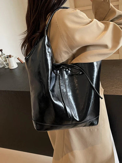 Bolsa de mano estilo cinta
