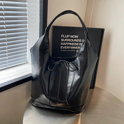 Bolsa de mano estilo cinta