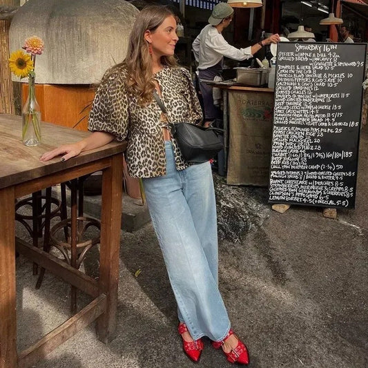 Blusa de moda con estampado de leopardo y mangas abullonadas