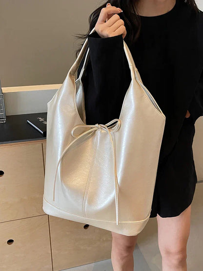 Bolsa de mano estilo cinta