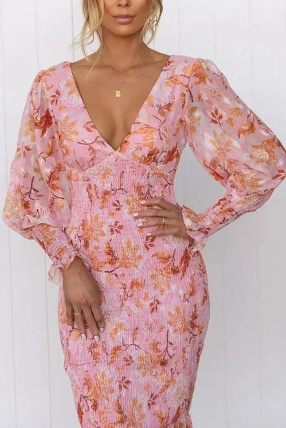 Delilah | Vestido midi floral con volantes