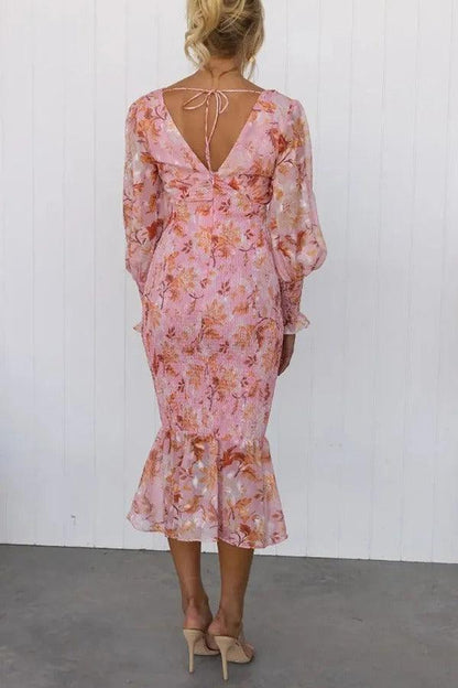 Delilah | Vestido midi floral con volantes