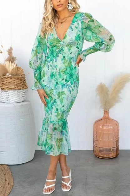 Delilah | Vestido midi floral con volantes