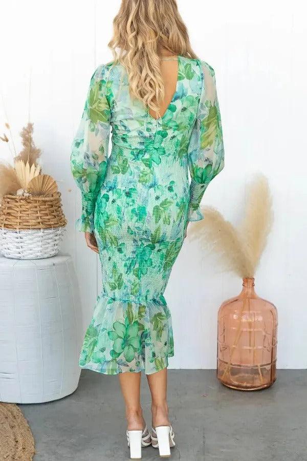 Delilah | Vestido midi floral con volantes