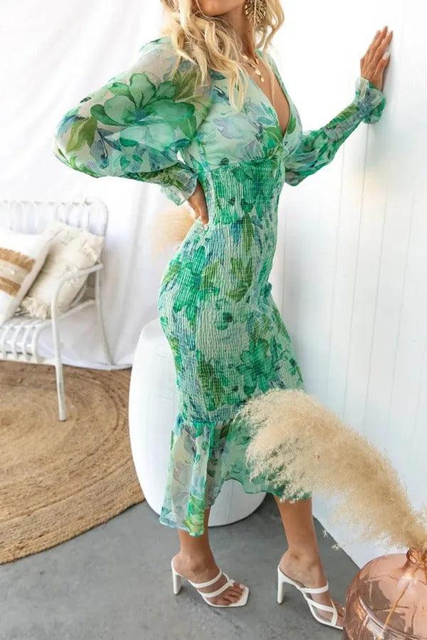 Delilah | Vestido midi floral con volantes