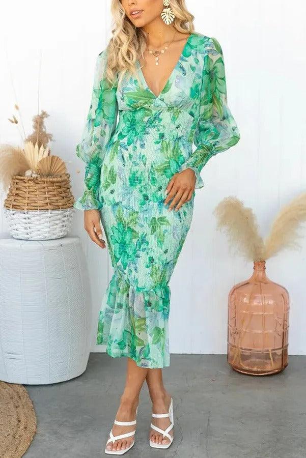 Delilah | Vestido midi floral con volantes