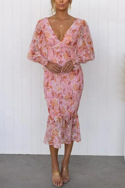 Delilah | Vestido midi floral con volantes
