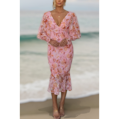 Delilah | Vestido midi floral con volantes