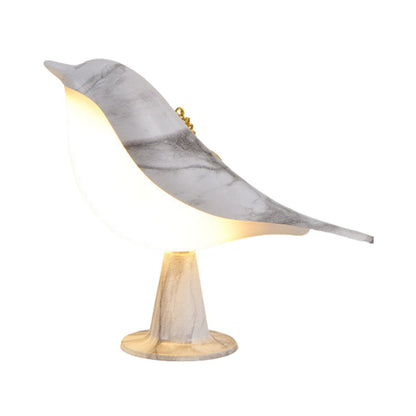 Lámpara de mesa con diseño de pájaro en acabado de madera
