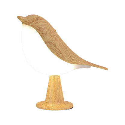 Lámpara de mesa con diseño de pájaro en acabado de madera