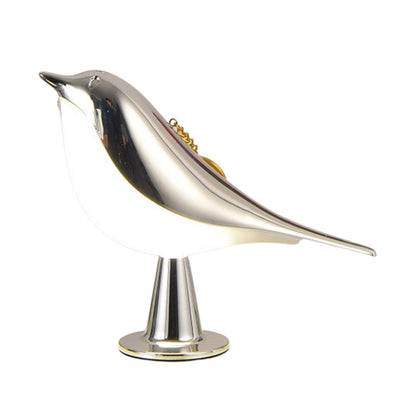 Lámpara de mesa con diseño de pájaro en acabado de madera