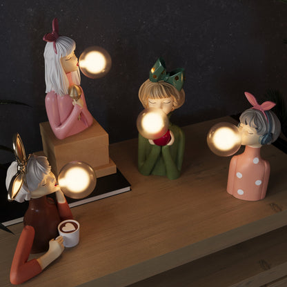 Lámpara de mesa moderna con diseño de niña en resina