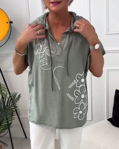 Lory | Camicetta con cappuccio floreale