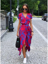 Vada - Vestido con escote en V, abertura y estampado Sunset Stroll