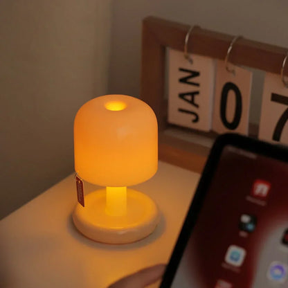 Lámpara de mesa con luz suave de resplandor al atardecer