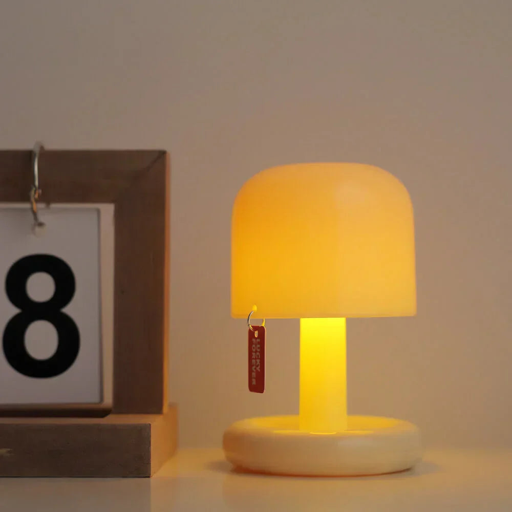 Lámpara de mesa con luz suave de resplandor al atardecer